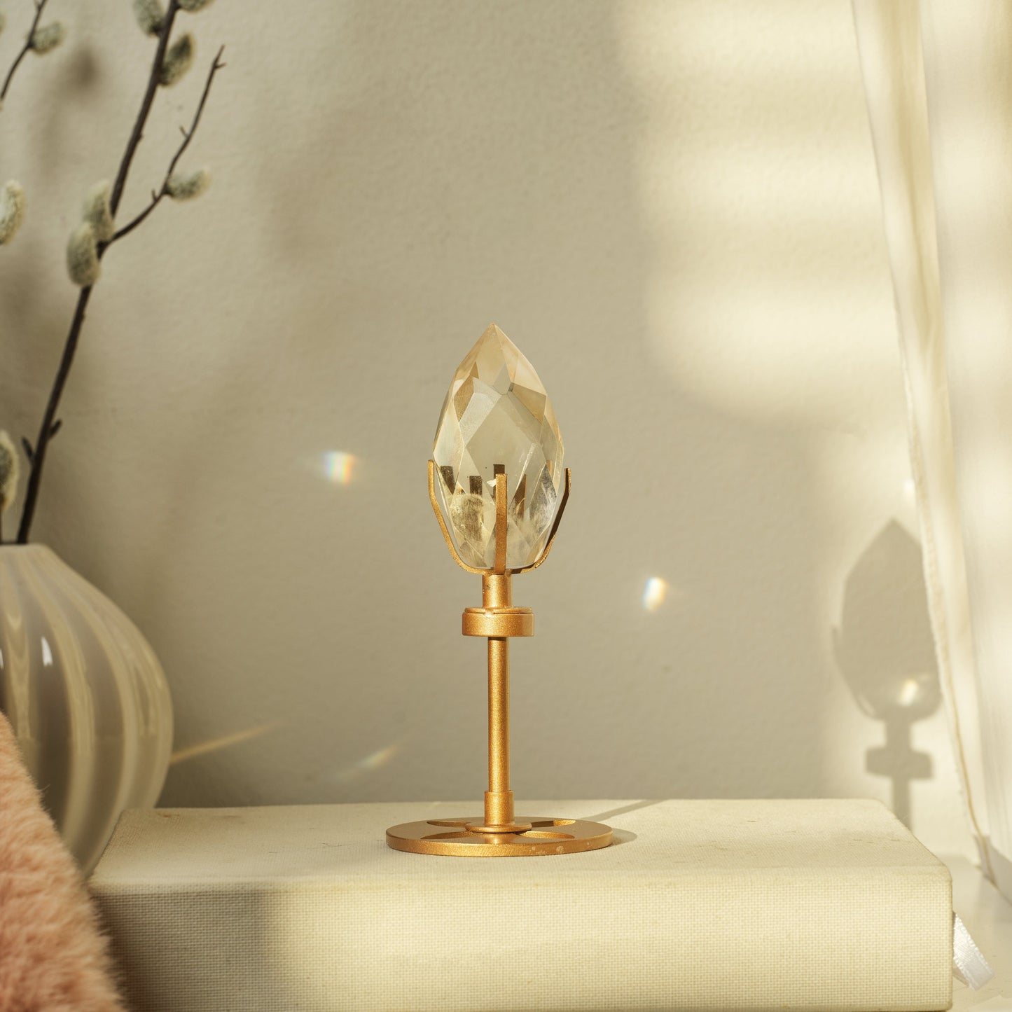 Hand Carved Faceted Quartz Objet with Gold Display Stand (13cm).