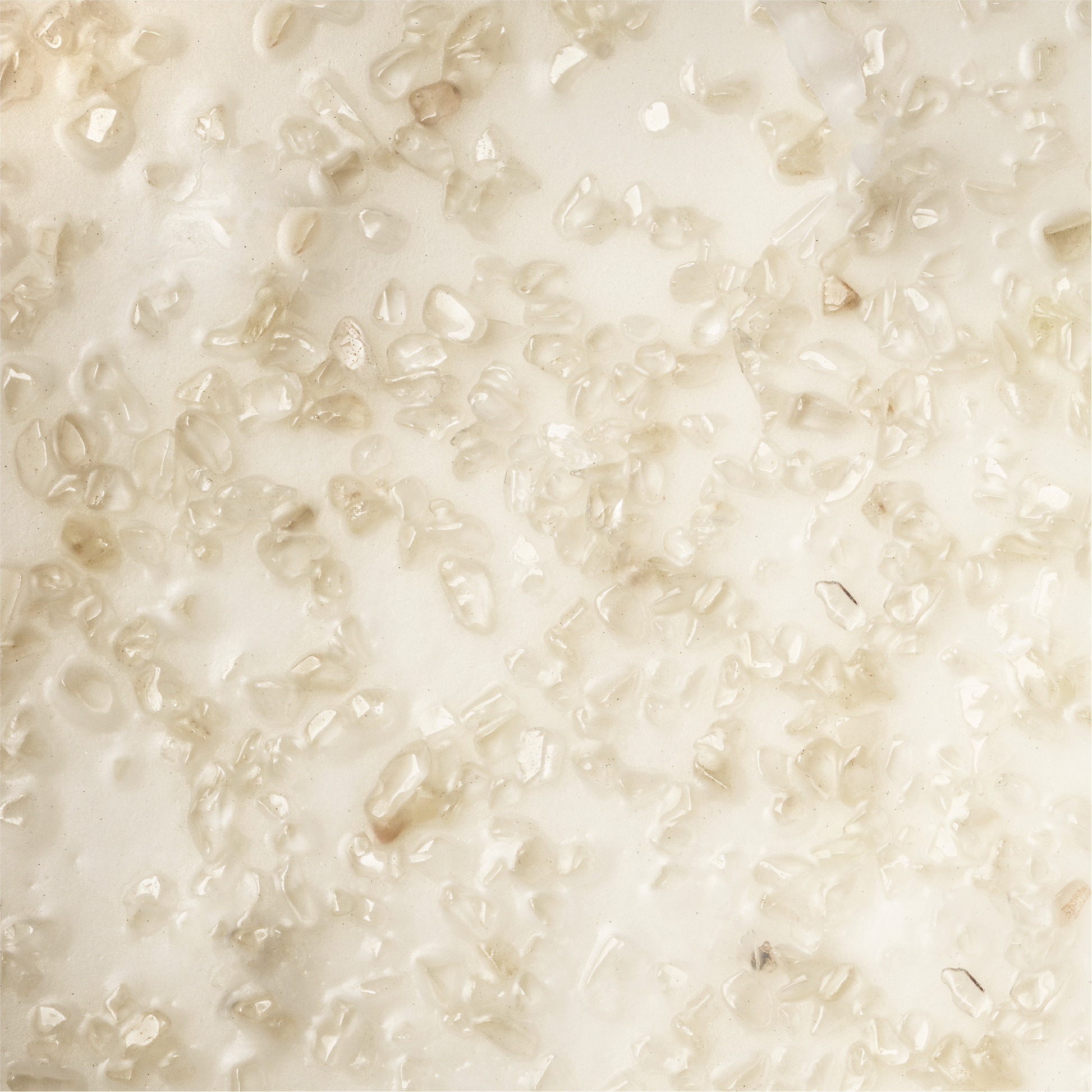 Close-up of a small pieces of clear quartz on wax 