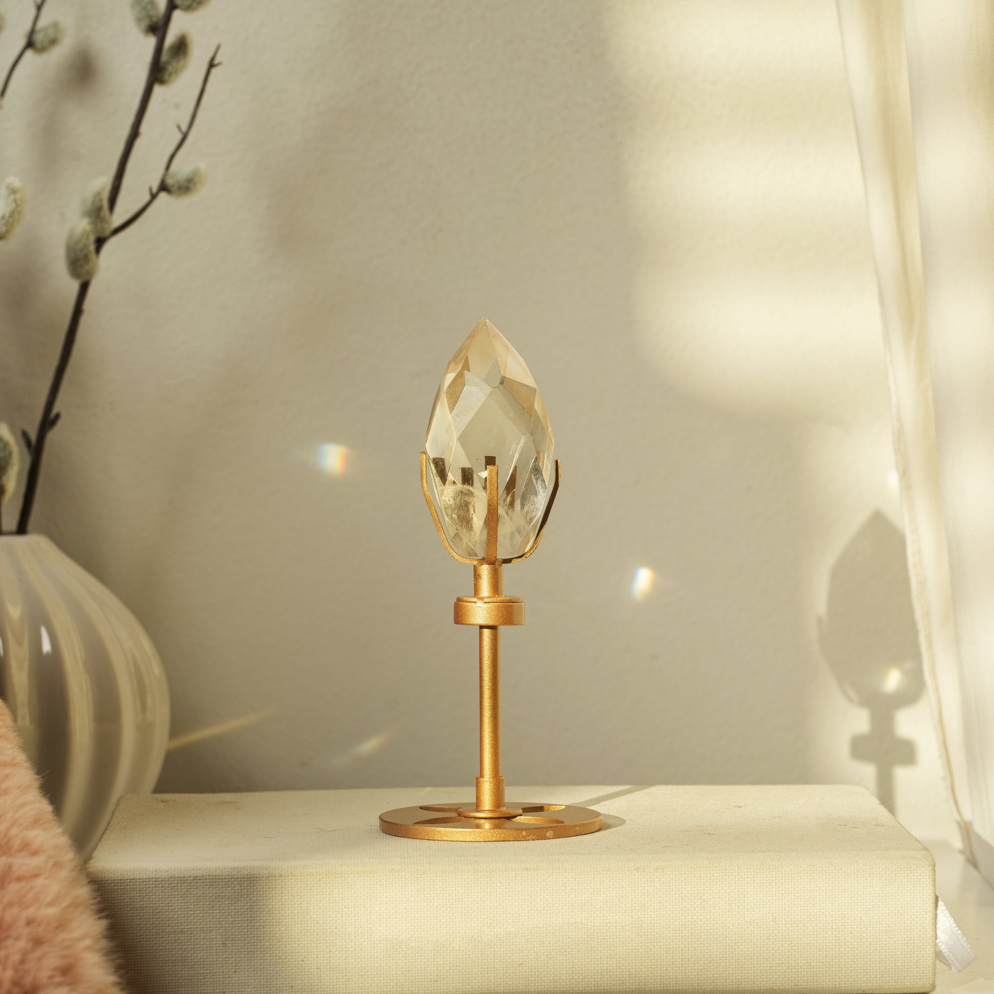Hand Carved Faceted Quartz Objet with Gold Display Stand (13cm).